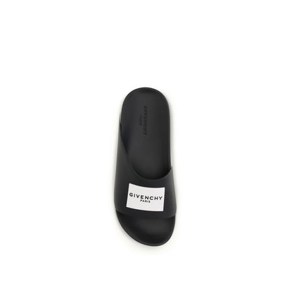 Givenchy – Mules Label Slide en Caoutchouc Noir | Design Asymétrique | AW26