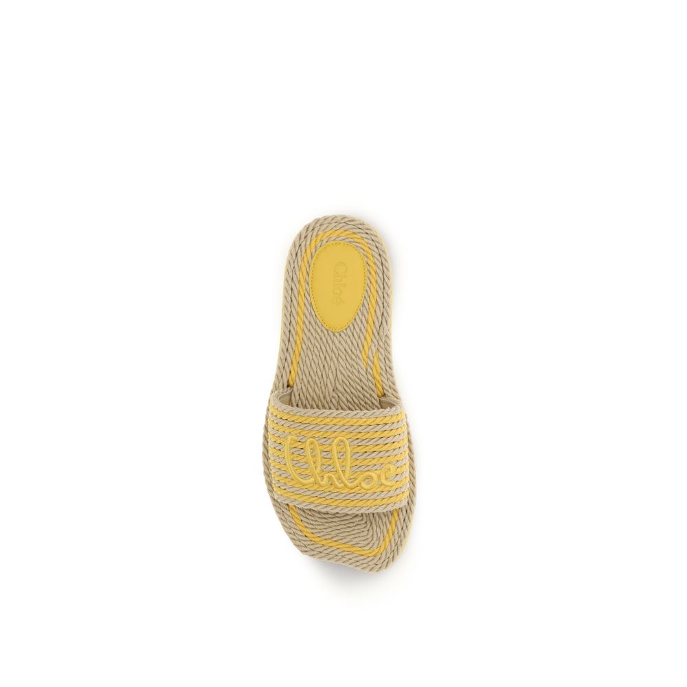 Chloé – Mules Plates en Raphia Tressé Bicolore Beige SS26